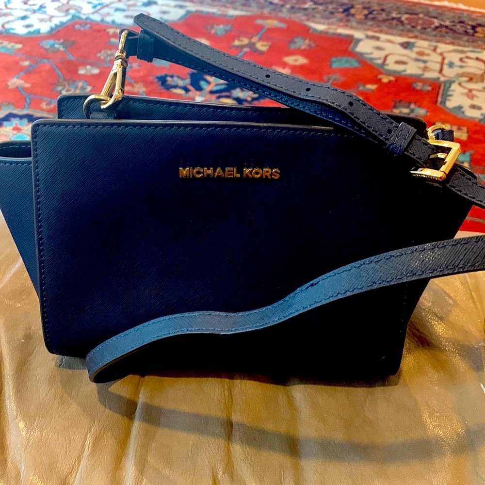 Michael Kors navy blue mini bag. inside car key clip. Crossbody strap